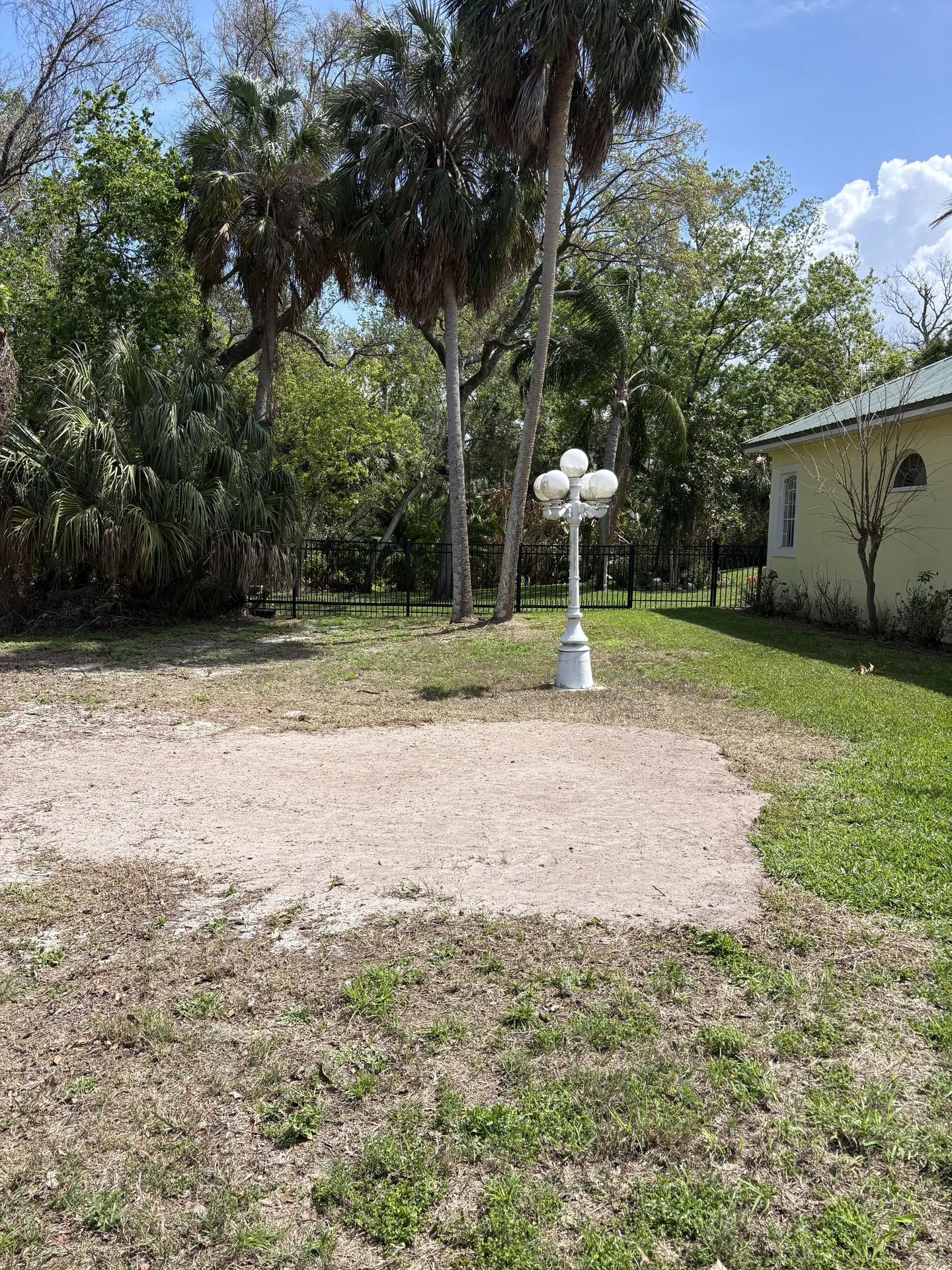 Front yard cleared and prepared for landscaping after stump grinding